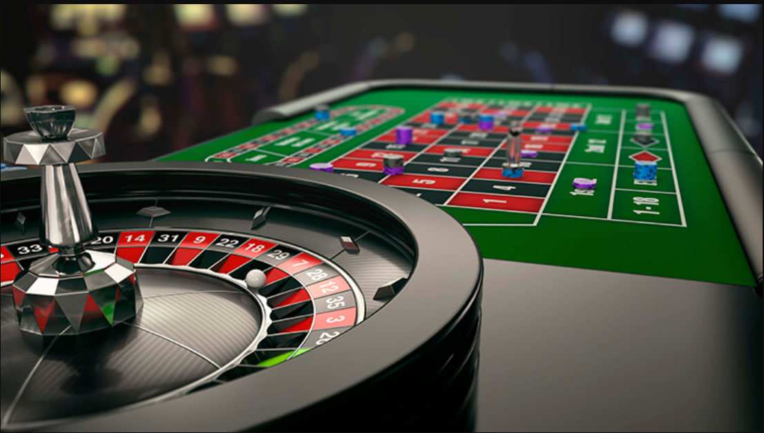 A photo of the interior of a vibrant and busy casino floor.